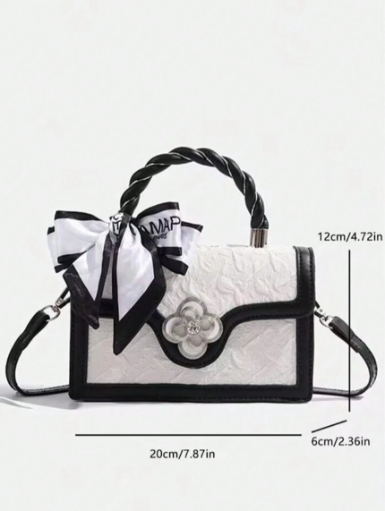 Luxury modern bag with a versatile square design and a cute cherry print