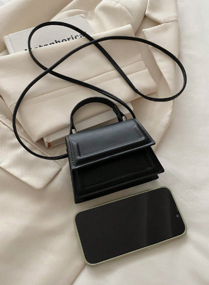 Elegant small handbag in solid color