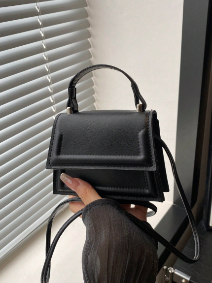 Elegant small handbag in solid color