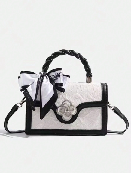 Luxury modern bag with a versatile square design and a cute cherry print