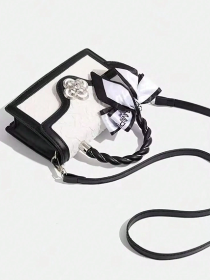 Luxury modern bag with a versatile square design and a cute cherry print